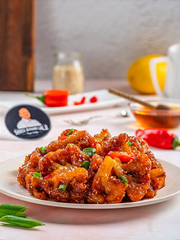 Honey Chilly Cauliflower glazed and garnished with spring onion