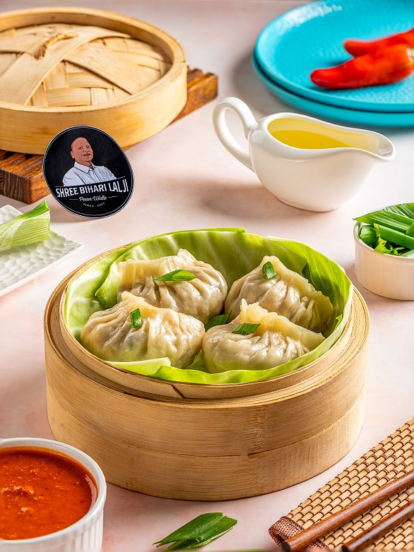 Veg Steam Momos in a bamboo steamer